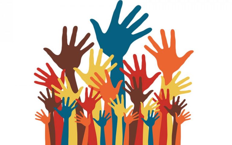 image of raised hands of all colors